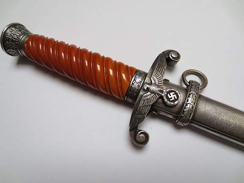Early slant grip army dagger by Eickhorn