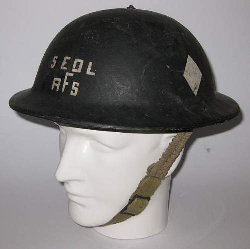 British WW2 civil helmet but what is it made of?