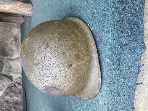 M1 helmet with battle damage