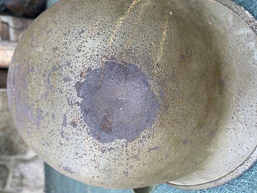 M1 helmet with battle damage