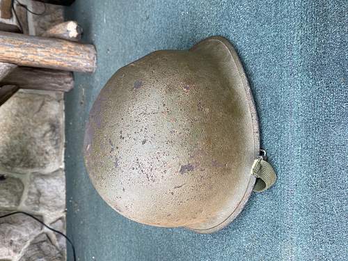 M1 helmet with battle damage