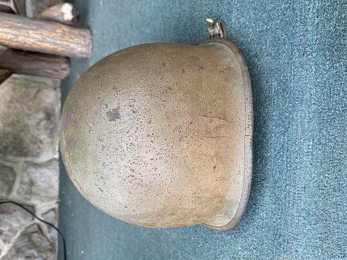 M1 helmet with battle damage