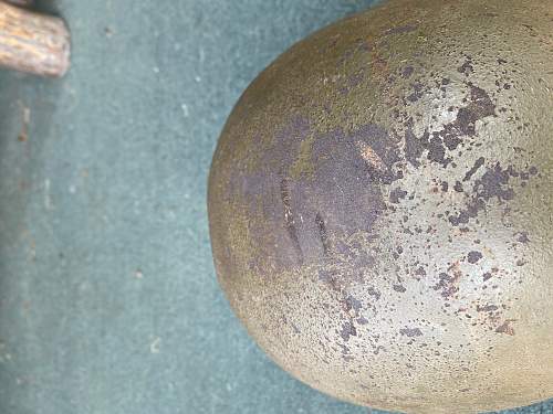 M1 helmet with battle damage