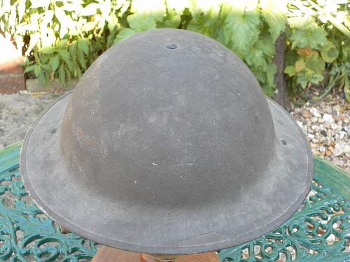 saved from the scrap man..ww2 British helmet shell