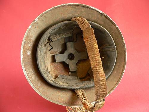 Please does anyone have any info this cardboard helmet and a non magnet steel Brodie