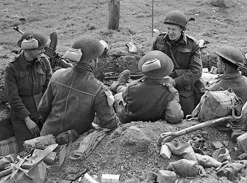 British helmet camouflage netting and field dressings.