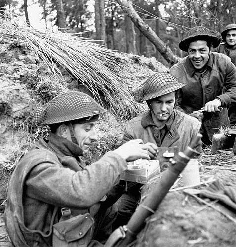 British helmet camouflage netting and field dressings.