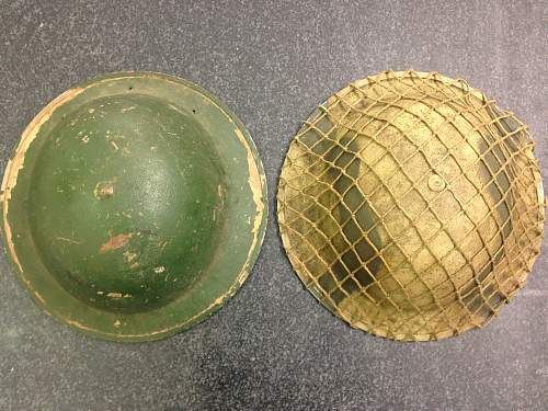 A couple of italy campaign helmets