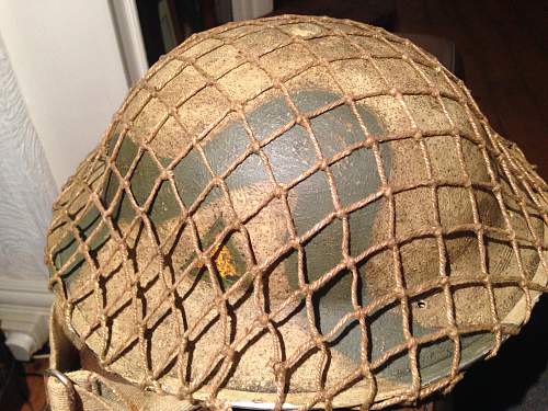A couple of italy campaign helmets