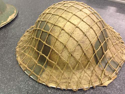 A couple of italy campaign helmets