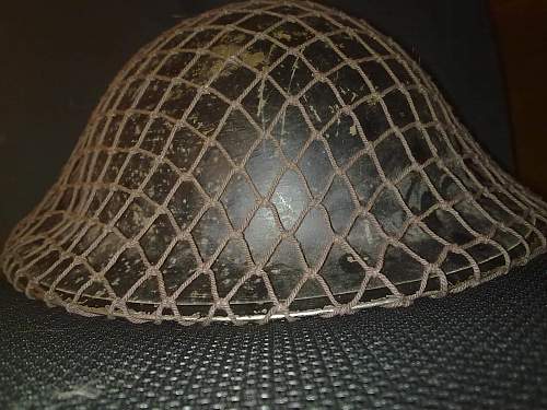 British 1939 helmet with camo net