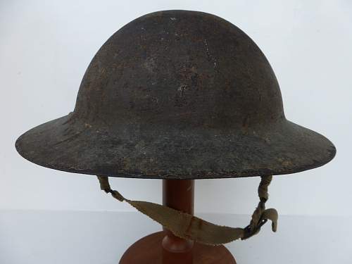 Strange Mark 2 Canadian helmet,,,,,any ideas.