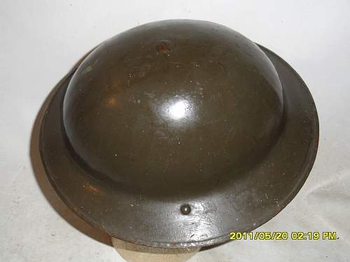 Strange Mark 2 Canadian helmet,,,,,any ideas.