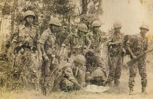 Need help to identify helmet, probably derivative from British paratrooper helmet