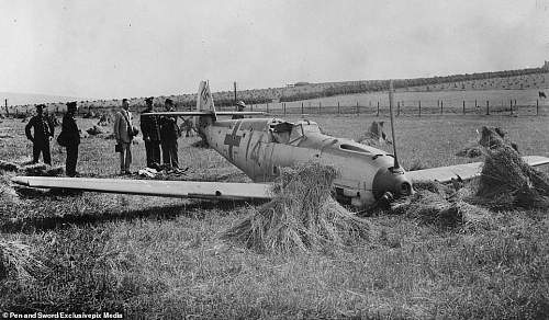 The charred remnants of Hitler's Luftwaffe: Rare photos reveals how British fields were littered with shot down German planes during the Battle of Britain