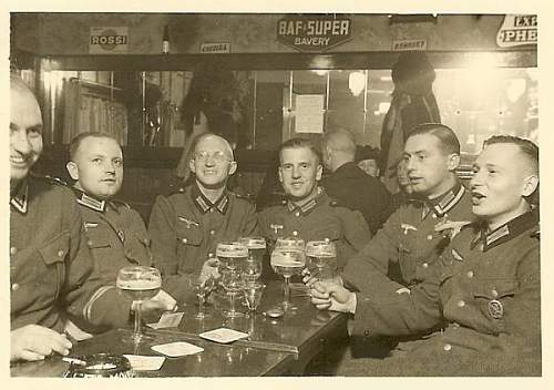 Advertisement. Photos of German soldiers with advertising signs.