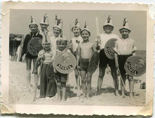 Advertisement. Photos of German soldiers with advertising signs.