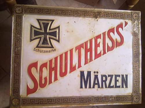 Advertisement. Photos of German soldiers with advertising signs.