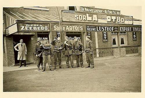 Advertisement. Photos of German soldiers with advertising signs.