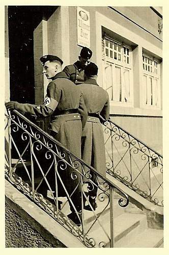 Advertisement. Photos of German soldiers with advertising signs.