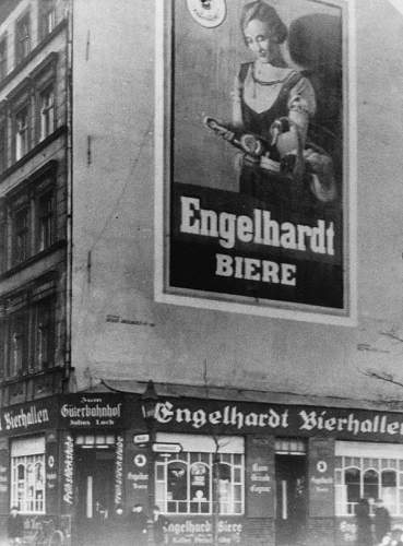 Advertisement. Photos of German soldiers with advertising signs.