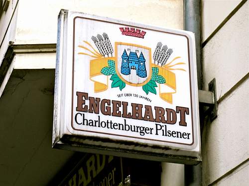 Advertisement. Photos of German soldiers with advertising signs.