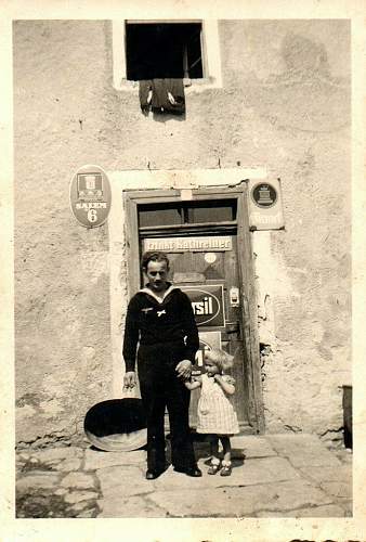 Advertisement. Photos of German soldiers with advertising signs.