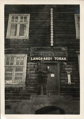 Advertisement. Photos of German soldiers with advertising signs.