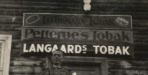 Advertisement. Photos of German soldiers with advertising signs.