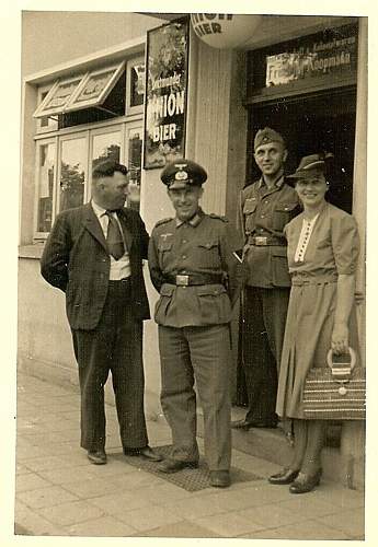 Advertisement. Photos of German soldiers with advertising signs.