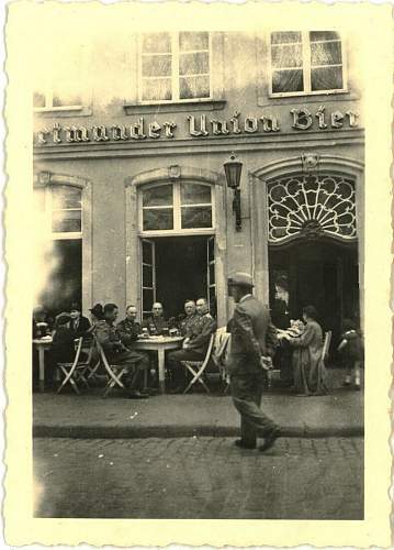 Advertisement. Photos of German soldiers with advertising signs.