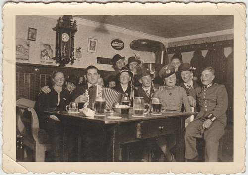 Advertisement. Photos of German soldiers with advertising signs.