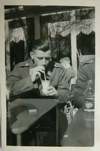 Advertisement. Photos of German soldiers with advertising signs.