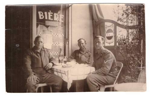 Advertisement. Photos of German soldiers with advertising signs.