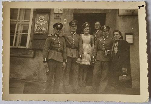 Advertisement. Photos of German soldiers with advertising signs.