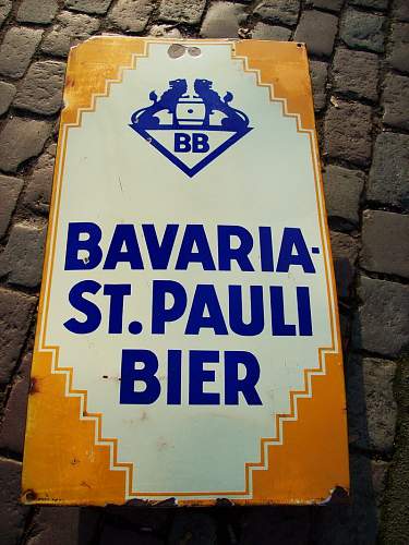 Advertisement. Photos of German soldiers with advertising signs.