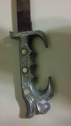 Searching for a sword, possibly Filipino