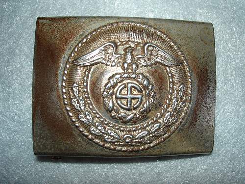 Please check this unmarked buckle for authenticity