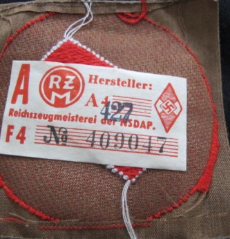 Someone willing to help me identify/authenticate this cloth patch for me?