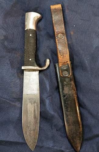 Hj knife with upside down blade