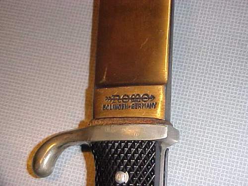 Is this a repro youth dagger?  ROMO?