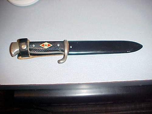 Is this a repro youth dagger?  ROMO?