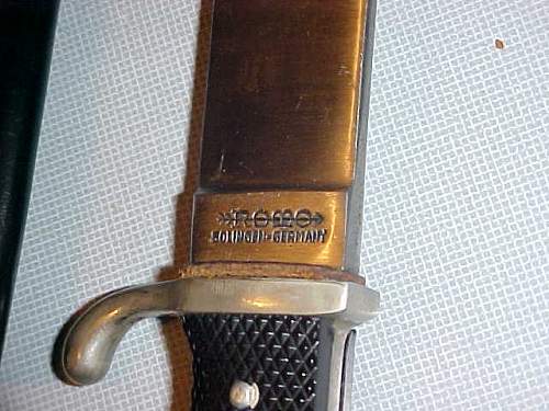 Is this a repro youth dagger?  ROMO?