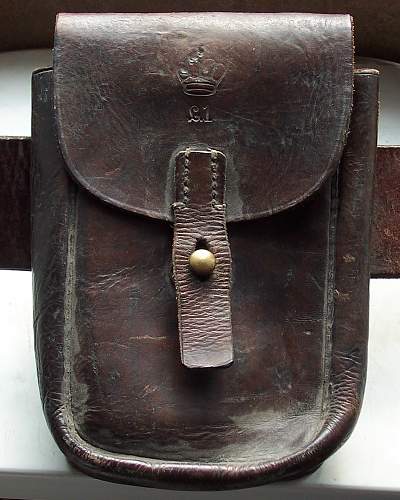 Crown stamped on leather pouch