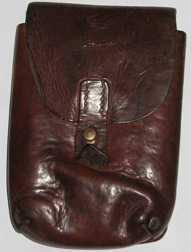 Crown stamped on leather pouch