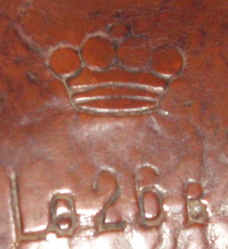 Crown stamped on leather pouch