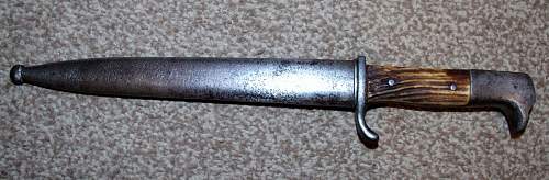 German dress bayonet. Is it converted, or just a poor example?