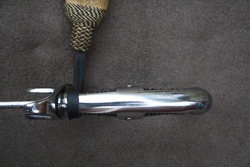 Info needed on German sabre with etching and blueing.