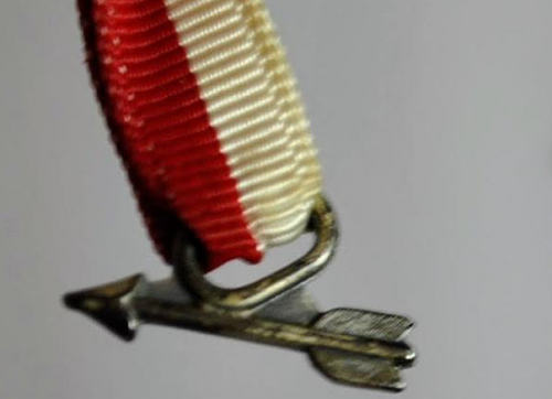 Military Arrow Ribbon Pin Insignia or Junk  ?