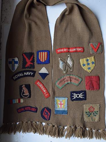 ATS Scarf with various formation badges, titles etc sewn on it